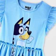 Your kiddo will love lounging on their bed in this Bluey Dress-Up Nightgown. Designed in a blue hue, this nightgown features a graphic of Bluey on the bodice with an allover print on the skirt for a fan-favorite look. Made from lightweight fabric, this nightgown offers them all-night comfort, while the cap sleeves with ruffles and sheer mesh overlay lend it an extra sweet flair. Playful Cotton Dress For Pajama Party, Cute Blue Sleepwear, Cute Blue Sleepwear With Character Print, Cute Blue Character Print Sleepwear, Blue Cotton Sleepwear With Character Print, Blue Character Print Sleepwear For Pajama Party, Fun Blue Sleepwear, Cute Character Print Dress For Sleepover, Cute Light Blue Sleepwear For Sleepover