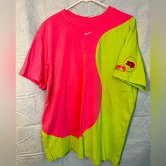 Nwt Oversized Size Small Women’s Nike Tee. Bright Pink And Neon Green. Nike Retro Tops For Streetwear, Nike Multicolor Tops For Streetwear, Nike Multicolor Tops With Graphic Print, Nike Retro Short Sleeve Top, Retro Nike Tops For Streetwear, Nike Oversized T-shirt For Streetwear, 90s Style Green T-shirt For Spring, Nike Casual Oversized T-shirt, Retro Nike Tops With Graphic Print