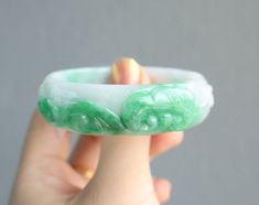 height 16mm thickness6mm  diameter 56mm *47mm fits  usual bangle size 53-54mm  comes with certificate Carved Green Jade Bangle, Green Carved Round Bangle, Oval Bangle, Burmese Jade, Burmese, Bright Green, Type A, Singapore, Jade