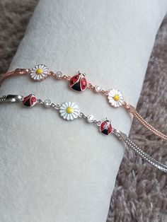 Sterling Silver Ladybug Bracelet-Daisy Flower Bracelet-Dainty Handmade Bracelet-Custom Bracelet-Populer Bracelet-Luck Bracelet-Love Bracelet-Bracelet for Women-Enameled Bracelet-Initial Bracelet-Gift For Her-Birthday Gift-Gift For Mom-Gift-Christmas Gift-New Year Gift-Bridesmaid Gift-Anniversarry Gift-Graduation Gift- Our product is produced with care from 925 Sterling Silver. There are 2 Models in our Bracelet. Enamel Application is Made on Daisy and Ladybug Figures. Our bracelet has 2 rows of Adjustable Flower Bracelets With Lobster Clasp, White Daisy Bracelets As Gift, Flower Charm Bracelet As A Gift, Dainty Flower Shaped Personalized Bracelets, Adjustable Flower-shaped Beaded Bracelets As Gifts, Dainty Beaded Bracelets With Flower Charm As Gift, Dainty Beaded Bracelet With Flower Charm For Gift, Flower Shaped Charm Bracelet For Gift, Dainty Adjustable Bracelet With Flower Charm