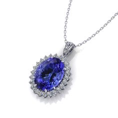 From concept to creation, this Tanzanite Lady Di Necklace was crafted by the master jewelry artisans at Jewelry Designs. Luxury Purple Tanzanite Necklace, Luxury Tanzanite Gemstones In Halo Setting, Exquisite Luxury Tanzanite Jewelry, Luxury Tanzanite Necklace For Women, Luxury Tanzanite Oval Pendant Necklace, Luxury White Gold Tanzanite Jewelry, Luxury Tanzanite Necklace With Brilliant Cut, Classic Tanzanite Necklaces With Diamond Cut, Classic Tanzanite Necklace With Diamond Cut