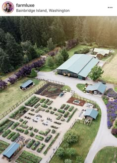 an aerial view of a farm with lots of trees and plants in the middle of it