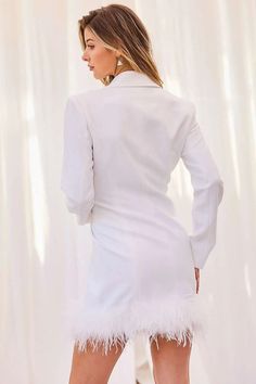 This chic off-white feather trim blazer dress is a must-have for any sophisticated wardrobe. Tailored from crepe-backed satin, this luxuriously comfortable dress is adorned with delicate feather trim that adds a beautiful finishing touch. Wear to a special occasion for an effortlessly glamorous look. Collar Neck Off white Shoulder Pad Bottom Feather Trim Double Button Solid Blazer Dress 97% polyester 3% span Sophisticated Wardrobe, Off White Blazer, Glamorous Look, White Feather, Feather Trim, Collar Neck, Classic Blazer, White Feathers, Line Store