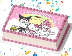 a birthday cake with hello kitty characters on it