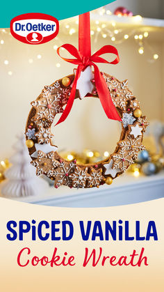 a christmas ornament hanging from a red ribbon with the words spiced vanilla cookie wreath