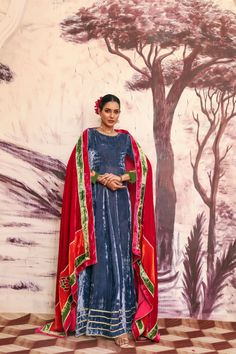 A traditional paneled steel blue pishwas, multicolored organza sleeves, with resham floral motifs and sequins, finished with gota laces at the hem. A multicolored velvet shawl dupatta paneled with gota laces and a handcrafted velvet appliqué florals at the pallu. Velvet Salwar Kameez With Dupatta For Wedding, Wedding Velvet Salwar Kameez With Dupatta, Festive Multicolor Designer Wear Dupatta, Festive Multicolor Designer Dupatta, Velvet Salwar Kameez For Eid Festivities, Traditional Velvet Anarkali Set With Traditional Drape, Unstitched Velvet Salwar Kameez For Designer Wear, Velvet Salwar Kameez With Sheer Dupatta For Festivals, Traditional Velvet Anarkali Set For Festive Occasions