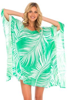 Having a stylish beach cover up is a must! The beautifully printed tunic beach coverup creates a vibrant look. Easy to pull on and easy to pack. Making clothes for the traveling woman. Boho design Lightweight beach dress Semi-Sheer Hand wash in cold water, hang to dry Tropical Multicolor Beach Dress Cover-up, Beachy Tropical Print Cover-up For Beach, Flowy Cover-up For Resort Season Vacation, Beachy Printed Pool Cover-up, Beach Party Tropical Print Cover-up, Lightweight Beachy Cover-up For Vacation, Green V-neck Beach Dress For Vacation, Summer Flowy Cover-up For Vacation, Flowy Summer Cover-up For Vacation