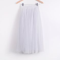 Beauty Long Tulle Skater Skirt Casual Long Tulle Skirt, White Relaxed Tulle Skirt, White Tulle Relaxed Skirt, Summer Stretch Tulle Petticoat, White Tulle Skirt With Relaxed Fit, Stretch Summer Tulle Petticoat, Summer Tulle Pleated Skirt With Relaxed Fit, Summer Tulle Pleated Relaxed Skirt, Summer Long Tulle Pleated Skirt