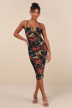 Sweep your special someone off their feet with an OOTN like the Lulus Date Night Beauty Dark Green Floral Print Mesh Ruched Midi Dress! Airy mesh knit, with a dreamy floral print, shapes this flattering dress that falls from adjustable spaghetti straps into a straight neckline with a fitted bodice. The figure-flaunting silhouette boasts trendy ruching at the sides before falling to a chic midi hem. Hidden back zipper/clasp. Fit: This garment fits true to size. Length: Knee to mid-calf length. Si