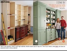 a couple standing next to each other in front of a green bookcase and cabinets