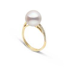 The gracefully curved solid gold and diamond band elegantly supports the lustrous 10.0-11.0 mm white Freshadama freshwater pearl. Freshadama pearls are sorted highest .01% of the freshwater pearl harvest each year. These pearls are exceptionally difficult to collect, and we've been proudly offering them for decades through our exclusive partnerships in Asia. With less than 5% deviation from a perfectly round shape, these pearls rival the finest saltwater pearls.By purchasing these pearls, you ar Saltwater Pearls, Pearl And Diamond Ring, Pearl Types, Pearl Color, Diamond Band, Pearl Size, Pricing Jewelry, Diamond Clarity, Diamond Bands