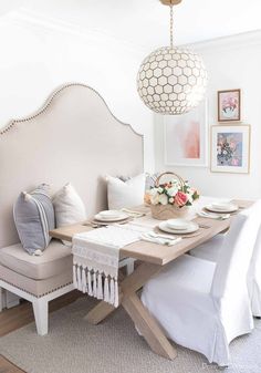 asymmetrical gallery wall above dining room table Diy Banquette Seating, Diy Banquette, Eating Nook, Best Neutral Paint Colors, Thistlewood Farms, Kitchen Banquette, Dining Room Furniture Modern