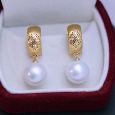 Get ready to feel like a classic style icon with House of Pearls 11-12mm freshwater pearl & vintage gold earrings. These gorgeous earrings are perfect for special occasions and everyday wear alike, with a timeless design that adds an air of elegance to any outfit. Make sure your jewelry box is stocked with these timeless classics — you’ll never go wrong pairing these earrings with anything from a business casual look to a formal ballgown. White 11-12mm Freshwater Pearl Earrings This popular earr Classic Pearl Earrings With Pendant For Anniversary, Classic Pearl Pendant Earrings For Anniversary, Classic Pearl Earrings In Yellow Gold, Timeless Gold Round Pearl Earrings, Luxury Pearl Pendant Round Earrings, Luxury Round Pearl Pendant Earrings, Classic Pearl White Earrings With Elegant Design, Classic Pearl Earrings With Elegant Design As Gift, Classic Yellow Gold Drop Pearl Earrings