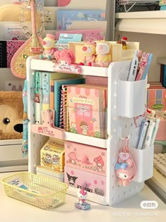 a shelf filled with lots of stationary items