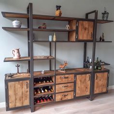 an entertainment center with shelves and wine bottles