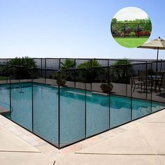 a pool fenced off with an umbrella next to it