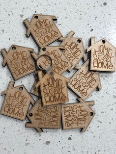 wooden tags that say home sweet home