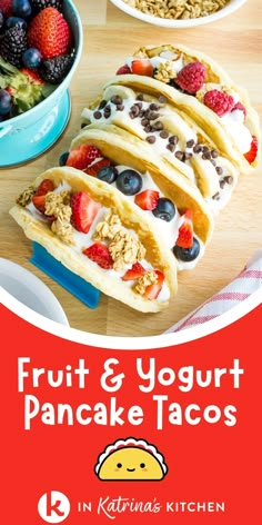 fruit and yogurt pancake tacos on a table with bowls of fruit