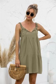 This summer tunic dress is perfect to dress up or down depending on your day. Easily pair this dress with your favorite leather sandals and summer accessories. MEASUREMENTS: Small - Chest & Waist: 35"-37"inMedium - Chest & Waist: 37"-39"inLarge - Chest & Waist: 39"-41"inXL- Chest & Waist: 41"-43"in Spring Sundress With Tie Straps For Day Out, Casual Mini Dress With Tie Straps For Summer, Casual Sundress For Summer Day Out, Casual Summer Sundress For Day Out, Casual Midi Dress For Spring Outing, Casual Mini Dress With Tie Straps For Spring, Casual Sundress For Summer, Casual Spring Mini Dress With Tie Straps, Spring Casual Mini Dress With Tie Straps