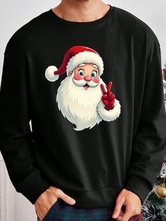 Comfort Meets Style: Santa Claus Print Black Drop Shoulder Crew Neck S Casual Crew Neck Tops For Holidays, Casual Holiday Crew Neck Tops, Black Long Sleeve Christmas T-shirt, Black Winter Holiday T-shirt, Casual Holiday Sweatshirt With Graphic Print, Casual Graphic Print Sweatshirt For Holiday, Casual Graphic Print Holiday Sweatshirt, Oversized Christmas Crew Neck Sweatshirt, Oversized Crew Neck Christmas Sweatshirt