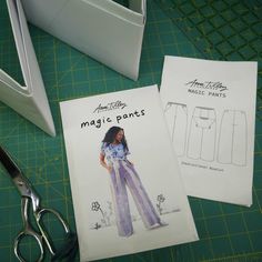 the sewing pattern is next to some scissors