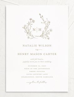 an elegant wedding card with the letter n on it