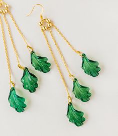 * Use discount FOURITEMS to get 10% off when you purchase 4 items or more across all our products (jewelry, ceremony items, etc) * Designed and handcrafted in the Philippines by Filipino women artisans * This handmade tropical drop earrings is made of gold-plated hooks and acrylic/resin leaves from Manila * Locally sourced materials to support traditional crafts * 5.5 inches in length, lightweight to wear all day * Each piece features 'intentional imperfections' - variations in exact size, cut, Filipino Jewelry, Resin Leaves, Pride Jewellery, Beautiful Veil, Pearl Rosary, Traditional Crafts, Shell Earrings, Women Artisans, Star Earrings