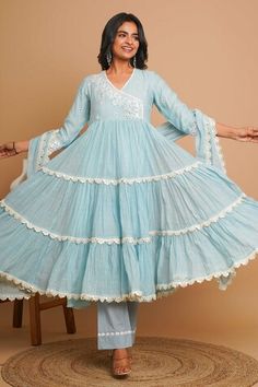 Powder blue angarkha style tiered anarkali featuring three fourth sleeves and V neck. Paired with lace embroidered hem pant and mirror lace border embellished dupatta., Fit: Relaxed Blue Cotton Sharara With Sheer Dupatta, Spring Anarkali Set With Traditional Drape, Blue Cotton Anarkali Set With Gota Work, Spring Anarkali Kurta With Gota Work, Blue Sharara With Chikankari Embroidery For Spring, Blue Chikankari Embroidery Sharara For Spring, Blue Chikankari Embroidered Sharara For Spring, Traditional Gota Work Dress For Spring, Anarkali Sharara With Gota Work For Spring