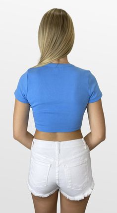 Perfect little tee - wear this one every day! A cute little ribbed knit cropped tee with a banded V-neckline and short sleeves is the perfect addition to your closet. Pair it with any bottoms for a comfortable and polished look. Color- Light Blue (Also Available in Orange, Royal, Green, Red, and Tan) 95% Polyester 5% Spandex Summer Cotton Cropped V-neck T-shirt, Casual Fitted V-neck Cropped T-shirt, Trendy V-neck Cropped T-shirt For Summer, Summer Cropped Ribbed T-shirt, Fitted Ribbed Cotton Crop Top, Summer Ribbed Crop Top With Short Sleeves, Basic Ribbed Cropped T-shirt For Summer, Trendy Short Sleeve Top With Ribbed Neckline For Summer, Trendy Summer Short Sleeve Top With Ribbed Neckline