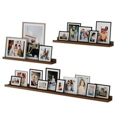 two wooden shelves with pictures on them and one shelf is holding photos, the other has multiple frames