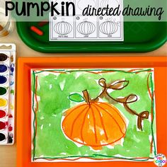 an art project with pumpkins and watercolor paints