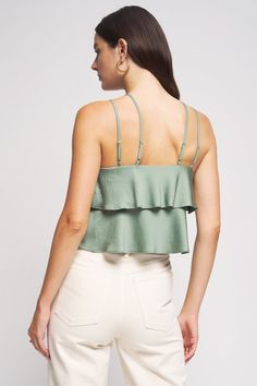 Flowing tiers fall from this modern petal top, accented by centered straps that give the illusion of a halter neckline with the comfort of a classic strap. For a head-to-toe monochromatic moment, style this crop with its perfect match: the Balinda Pant. Halter Neckline, Perfect Match, Cactus, Blouses, In This Moment