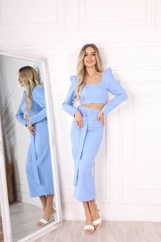 Fabric: Crepe Composition: Viscose 50%, Polyester 40%, Elastane 10% Included Top, Skirt Long Sleeve Top High-rise skirt Maxi skirt Available colors: Black, White, Sky-Blue