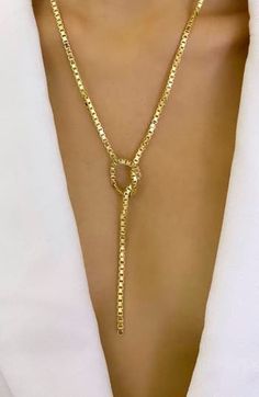 Just the right accent for any look, this sterling-silver lariat necklace plated in 18-karat gold boasts an adjustable length and a versatile box-chain design. 20" length; 3" drop Sterling silver/18k-gold plate Imported Latinx Owned/Founded Formal Lariat Necklace With Gold Chain, Gold-plated Lariat Necklace With Gold Chain, Yellow Gold Lariat Necklace For Party, Gold-tone Long Lariat Necklace For Formal Occasions, Formal Gold-tone Lariat Necklace With Delicate Chain, Formal Gold Chain Lariat Necklace, Formal Gold Lariat Chain Necklace, Gold-tone Lariat Chain Necklace, Gold-tone Lariat Jewelry As A Gift