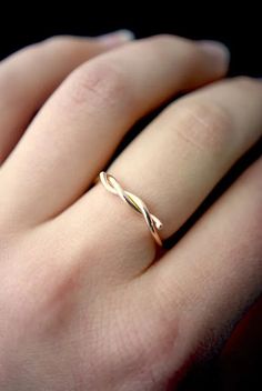 A thick, sleek and durable barbwire inspired ring. Add a unique twist to your stack! This listing is for ONE SINGLE Barbed Wire Ring in SOLID 14K GOLD. To create the Barbed Wire Ring, we wrap metal wire in to a twisted shape. This ring is a great alternative to a simple band and pairs perfectly with other stacking rings. These make perfect bridesmaid or friendship rings! Every piece is organic and unique — no two Hannah Naomi pieces are exactly alike.Hand-crafted to order in our Portland, OR stu Barbed Wire Ring, Simple Ring Design, Thick Gold Ring, Gold Knot Ring, Ocean Ring, Gold Wave Ring, Gold Waves, Jewelry Logo, Nautical Jewelry