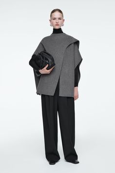 WOOL-BLEND CAPE - Gray - Coats and Jackets - COS Elegant Oversized Wool Poncho, Formal Wool Cape Outerwear, Wool Cape For Formal Occasions, Winter Wool Poncho For Work, Elegant Wool Poncho For Winter, Wool Poncho For Winter Workwear, Cashmere Cape For Winter, Elegant Wool Poncho For Workwear, Elegant Cashmere Winter Cape