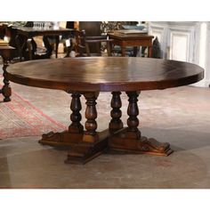 a wooden table sitting on top of a floor