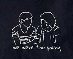 two people standing next to each other in front of a black background with the words we were too young written on it