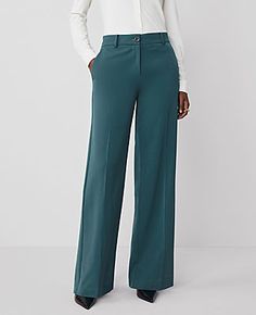 A modern must-have with a statement leg and flattering high waist. Front zip with button closure. Belt loops. Front off-seam pockets. Back besom pockets.,Leg Shape:Wide-Leg – a modern must-have with a statement leg and flattering high waist,Rise:High rise: sits 1/2" to 1" below natural waist,Imported:Imported,Fit:Relaxed & easy,Length:Full length: 31" inseam with 24" leg opening,Fabrication:62% Polyester, 34% Viscose, 4% Spandex,Garment Care:Machine Washable The Perfect Wide Leg Pant by Ann Tayl Fall Workwear Bottoms With Button Zip Fly, Modern Bottoms With Button Closure For Fall, Modern Mid-rise Workwear Bottoms, Modern Mid-rise Workwear Pants, Fall Dress Pants For Workwear With Button Closure, Fall Work Pants With Welt Pockets, Chic Workwear Pants With Button Zip Fly, Mid-rise Bottoms For Workwear In Fall, Mid-rise Fall Workwear Bottoms