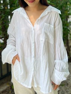 "Introducing the ultimate summer shirt that's perfect for beachwear, as a swimsuit cover, and beyond - the Muslin Double Gauze Long Sleeved Loose Fit Shirt. Made from high-quality double gauze crepe cotton material, this versatile shirt is soft, lightweight, and breathable, making it ideal for hot summer days. Fits Small, Medium and Large Front Length - 29\" Back Length - 30\" Sleeve Length - 23.5\" Bust - 44\" The loose fit design of the shirt allows for maximum comfort and freedom of movement, Summer Beachy Long Sleeve Tops, Summer Beach Button-up Shirt, Beachy Long Sleeve Tops For Beach Season, Relaxed Beach Cover-up Tops, Long Sleeve Tops For Summer Beach Cover-up, Beachwear Long Sleeve Blouse For Beach Cover-up, Beachwear Long Sleeve Blouse Cover-up, Long Sleeve Blouse For Beach Cover-up, Long Sleeve Beachwear Blouse For Beach Cover-up