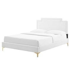 Cultivate an aura of refinement in your master bedroom or guest room decor with the sleek design of the Liva Performance Velvet King Bed. The modern upholstered headboard features delicate French piping and is an alluring focal point sturdily constructed on solid plywood and MDF frame. Complementing mid-century modern, contemporary, or eclectic decors, the Liva Upholstered King Bed brings an essence of restfulness, featuring stain-resistant performance velvet and dense foam padding. This king pl White And Gold Bed Frame, White And Gold Bedding, Bedroom Modern Contemporary, Velvet King Bed, Gold Bed Frame, White Beds, Bed Frame Platform, Bed Frame King Size, Bed Frame King