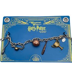 the wizard's world of harry potter charm bracelet is shown on a blue card