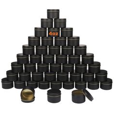 a large pyramid made out of black and gold containers with the number forty on it