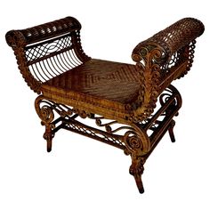 an ornate wooden chair with wicker seat and armrests is shown in front of a white background