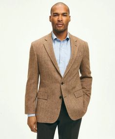 A classic piece and designer favorite, our herringbone sport coat features Italian-woven wool in neutral tones that go just as well with your oxford shirts as they do with your dress styles. Our signature attention to detail gives a natural shoulder drape, a meticulous bufferfly lining and the kind of craftsmanship you can only find here..CLASSIC FIT: Our average fit across chest, body and sleeves. (formerly known as Regent Fit).2-button; side vents; half lined; finished sleeves.100% Wool.Dry Cl Oxford Shirts, Flannel Dress, Logo Knit, Wool Flannel, Knit Tie, Mens Dress Pants, Oxford Shirt, Brooks Brothers, Chinos Pants