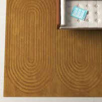 an overhead view of a bed with a wooden headboard and foot board