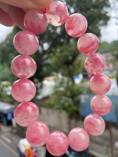 Material:pink rhodonite beads  size :Approx 14mm   quantity: one strand  6mm approx 29 pcs one strands 7mm approx25 pcs one strands 8mm approx 22 pcs one strands 9mm approx 21pcs one strands 10mm approx 19 pcs one strands 11mm approx 18pcs one strands 12mm approx 16 pcs one strands 13mm approx 16 pcs one strands 14mm approx 15 pcs one strands 15mm approx 14pcs one strands 16mm approx 14 pcs one strands 17mm approx 13pcs one strands 18mm approx 13pcs one strands 19mm approx 12pcs one strands 20mm Pink Hand-strung Round Crystal Bracelet, Pink Beaded Jewelry With 8mm Round Beads, Pink Hand-strung Crystal Bracelet, Pink Rose Quartz Round Beaded Bracelets, Pink Round Beaded Jewelry 8mm, Pink Round 8mm Bead Jewelry, Pink Spiritual Beaded Bracelet With Polished Beads, Pink Round Spiritual Beaded Bracelets, Spiritual Pink Beaded Bracelets With Polished Beads