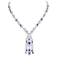 An exclusive Art Deco design necklace, so chic and elegant, a very piece of art . Necklace come in 18k gold with 18 pieces of natural Ceylon sapphires , fine quality, 12,27 carats, and 416 pieces of natural diamonds 4,98 carats, F color VS clarity. Piece of high jewelry. Handcrafted by artisan goldsmith. Excellent manufacture and quality. Whosale price. Note: on my shipment, customers not pay taxes. Luxury Sapphire Necklace Hallmarked, Luxury Sapphire Necklace For Formal Occasions, Luxury Sapphire Necklace With Diamond, Luxury Sapphire Necklace With Brilliant Cut, Luxury Sapphire Pendant Necklace, Formal Sapphire Diamond Necklace In Fine Jewelry Style, Sapphire Diamond Necklace For Formal Occasions, Luxury Sapphire Necklace, Formal Sapphire Diamond Necklace