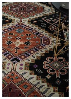 This traditional Heriz area rug is hand knotted and crafted from durable wool, making it an ideal piece to anchor any indoor space. It features stunning, contrasting hues of rust, ivory and black that will easily complement any decor. Hand-Knotted Rug All sizes are made to order in 30-45 days Made with Wool Color: Rust, Ivory, and Black Made with 22 knots per square inch This specific rug is made in India, in the city of Bhadohi. Bhadohi is one of the biggest rug manufacturing cities. Carpet wea Dark Eclectic Living Room, Moss Rug, Rustic Area Rugs, Carpet Shampoo, Southwest Decor, Farmhouse Boho, 4x6 Area Rugs, Big Rugs, Area Rug Sizes