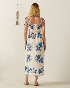 Crafted in cotton voile, our blue floral print sleeveless dress has a smocked bodice and adjustable tie straps. The summer dress has a cotton lining and is inspired by vintage Provençal textiles. Alix Of Bohemia, Dresses Royal, Panel Dress, Sleeveless Dress Summer, White Floral Dress, Blue China, Modern Wardrobe, Blue Floral Print, Knitwear Tops